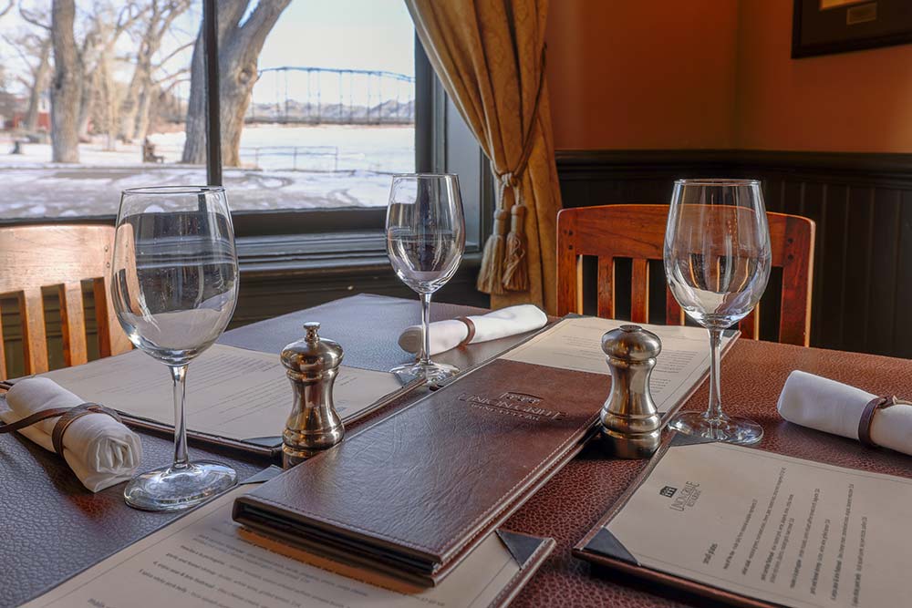 Dining-with-a-view-at-Grand-Union_Credit-Sarah-Bolt-Tempest-Technologies Dining table with place settings at the Grand Union