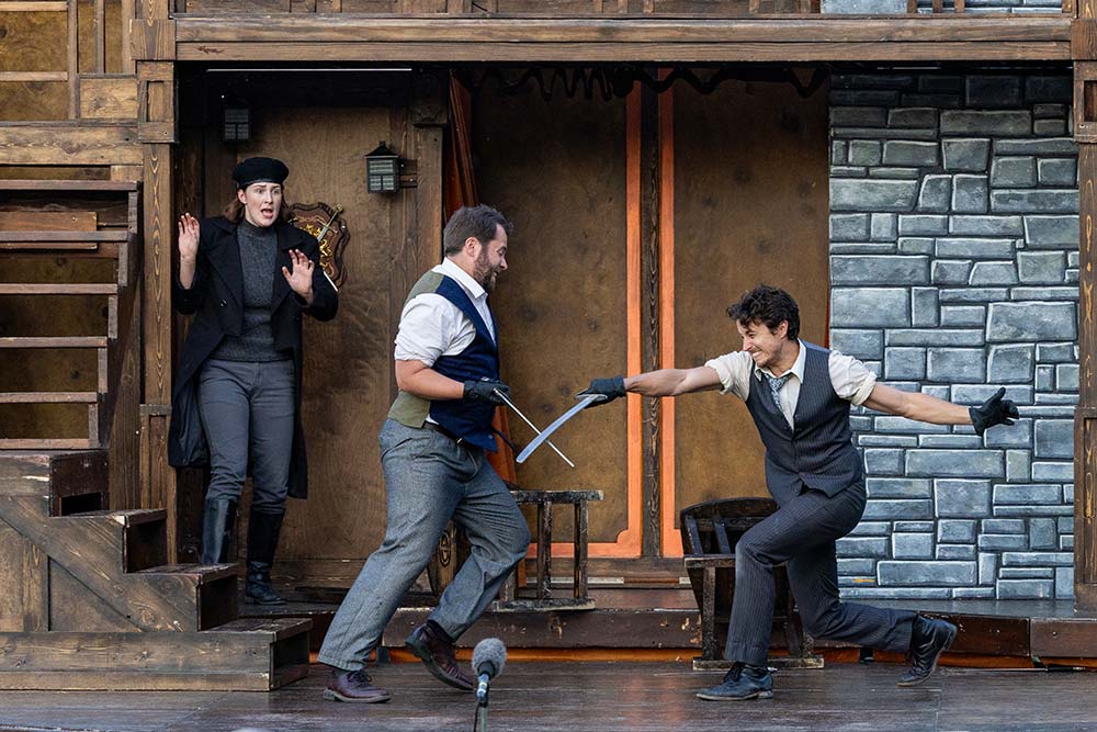 Montana-Shakespeare-in-the-Parks_Boulder_Photo-Credit_-Sarah-Bolt-Tempest-Technologies_-76 Montana Shakespeare in the parks Boulder - two men in a sword fight with a woman onlooker